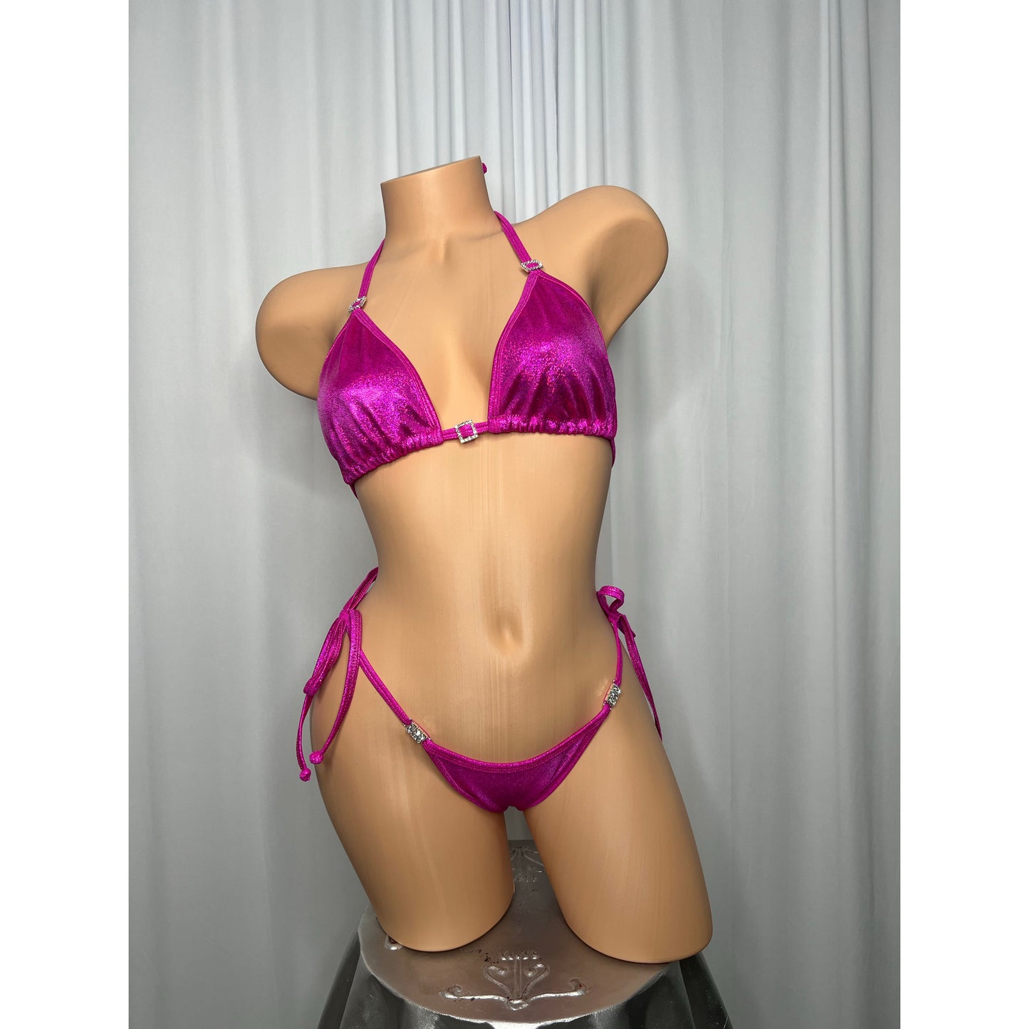 Posing suit in holographic fabric